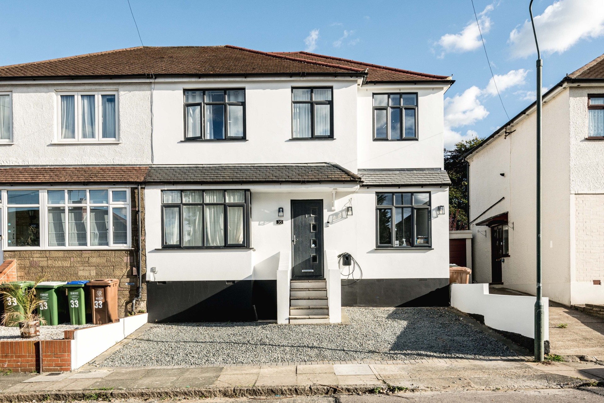 Completed two-storey side extension viewed from the street